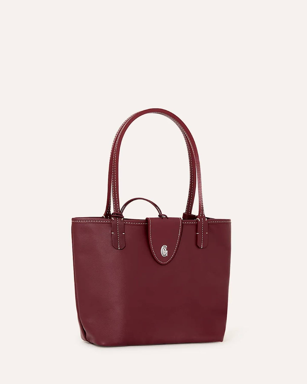 Goyard Sac Anjou Mini reversible tote bag in burgundy leather, front view with double top handles.