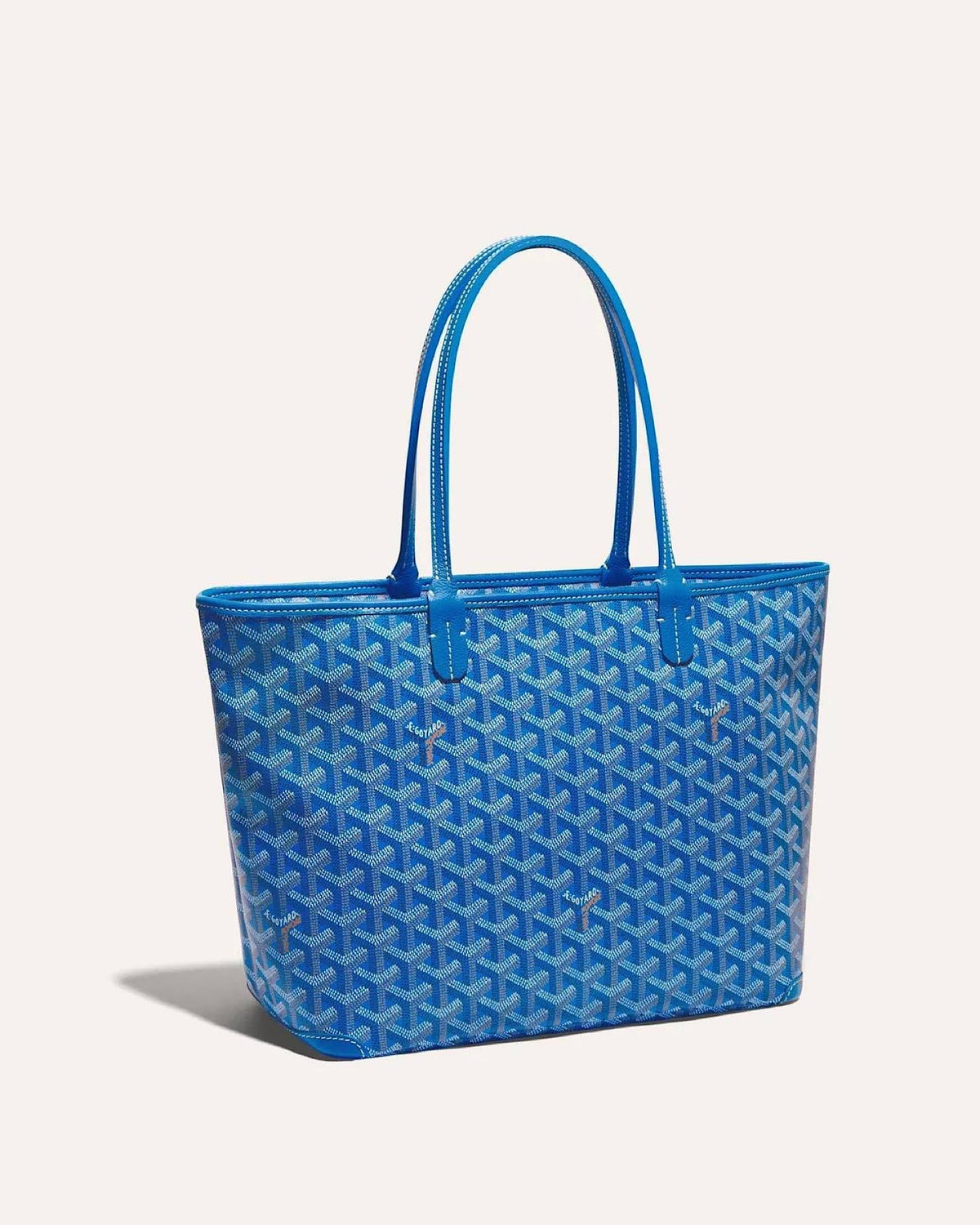 Authentic Goyard Artois PM tote bag in sky blue Goyardine canvas – angled side view