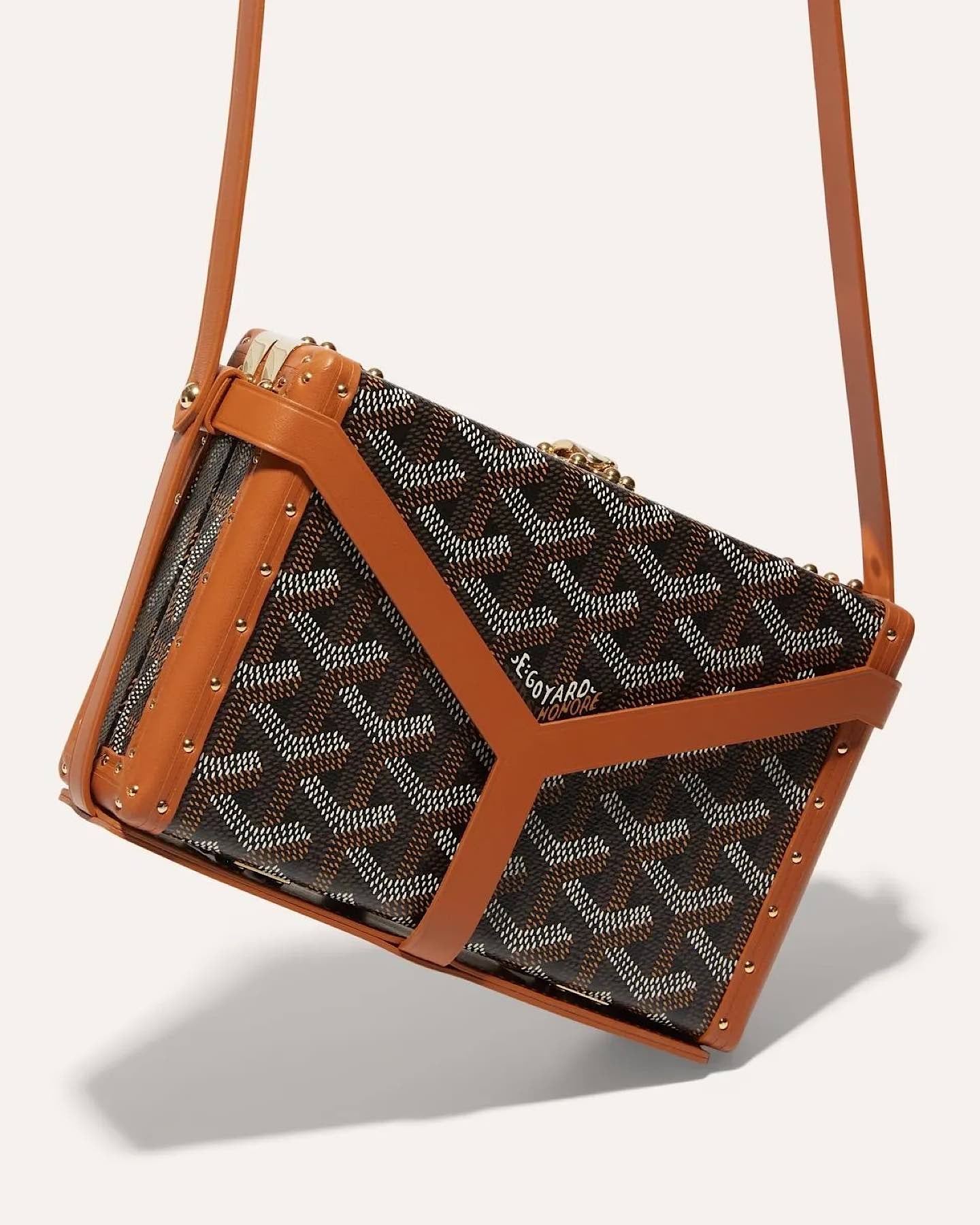 Goyard Minaudière Trunk Bag in signature Goyardine canvas with leather trim and palladium hardware, featuring a structured trunk silhouette and detachable shoulder strap.