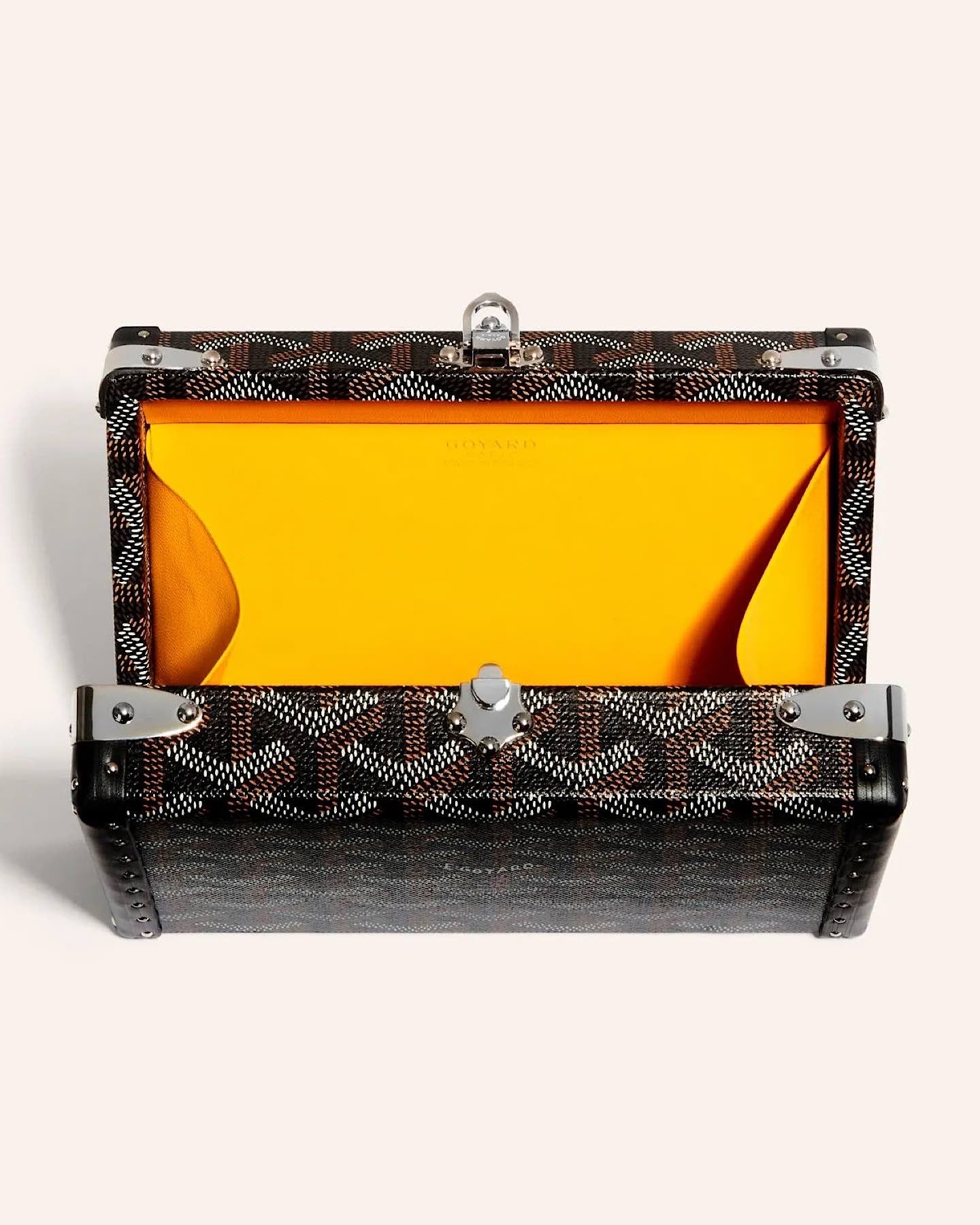 Goyard Minaudière Trunk Bag in black and grey Goyardine canvas with palladium hardware, leather trim, detachable shoulder strap, and signature trunk-inspired design.