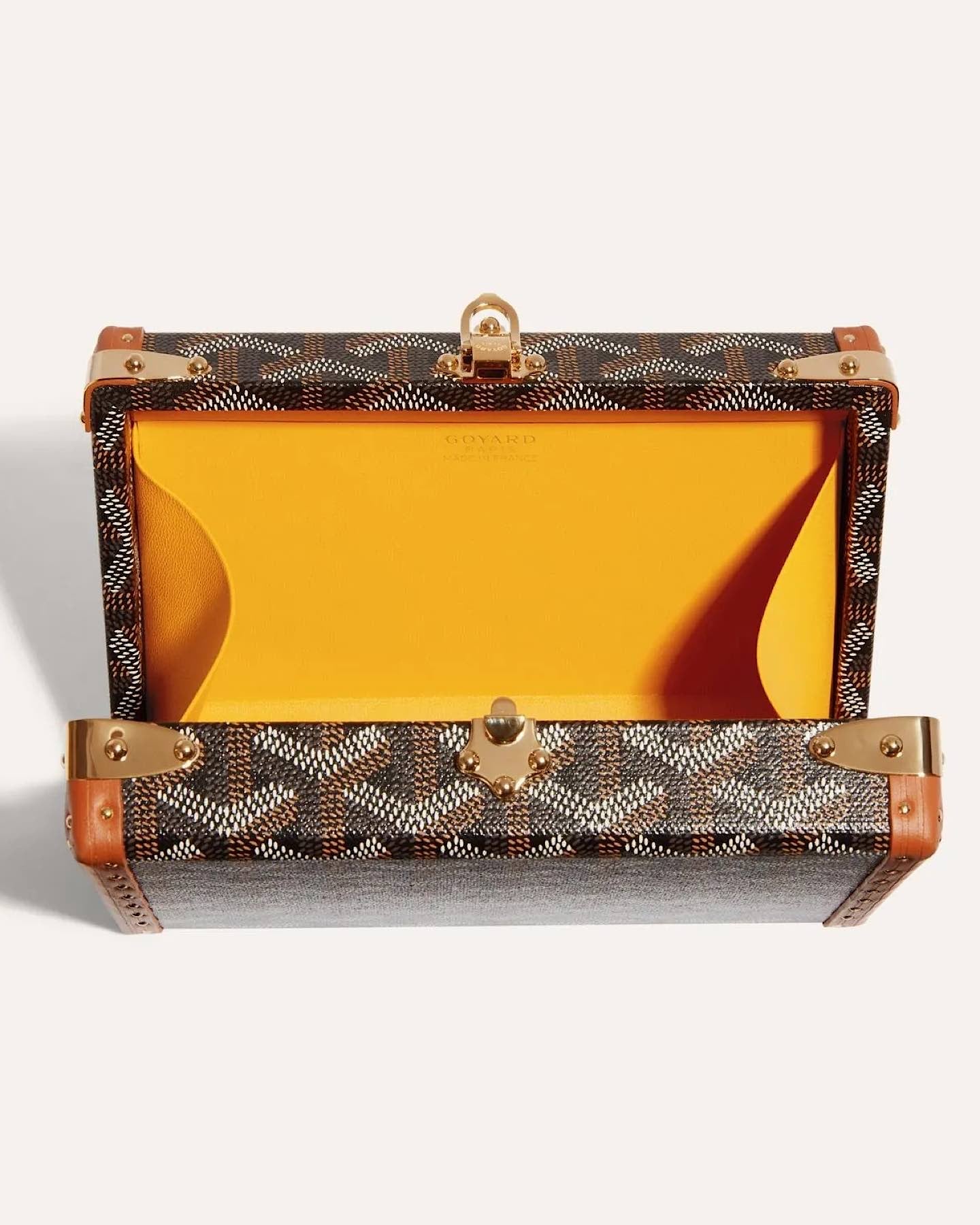 Goyard Minaudière Trunk Bag in signature Goyardine canvas with leather trim and palladium hardware, featuring a structured trunk silhouette and detachable shoulder strap.