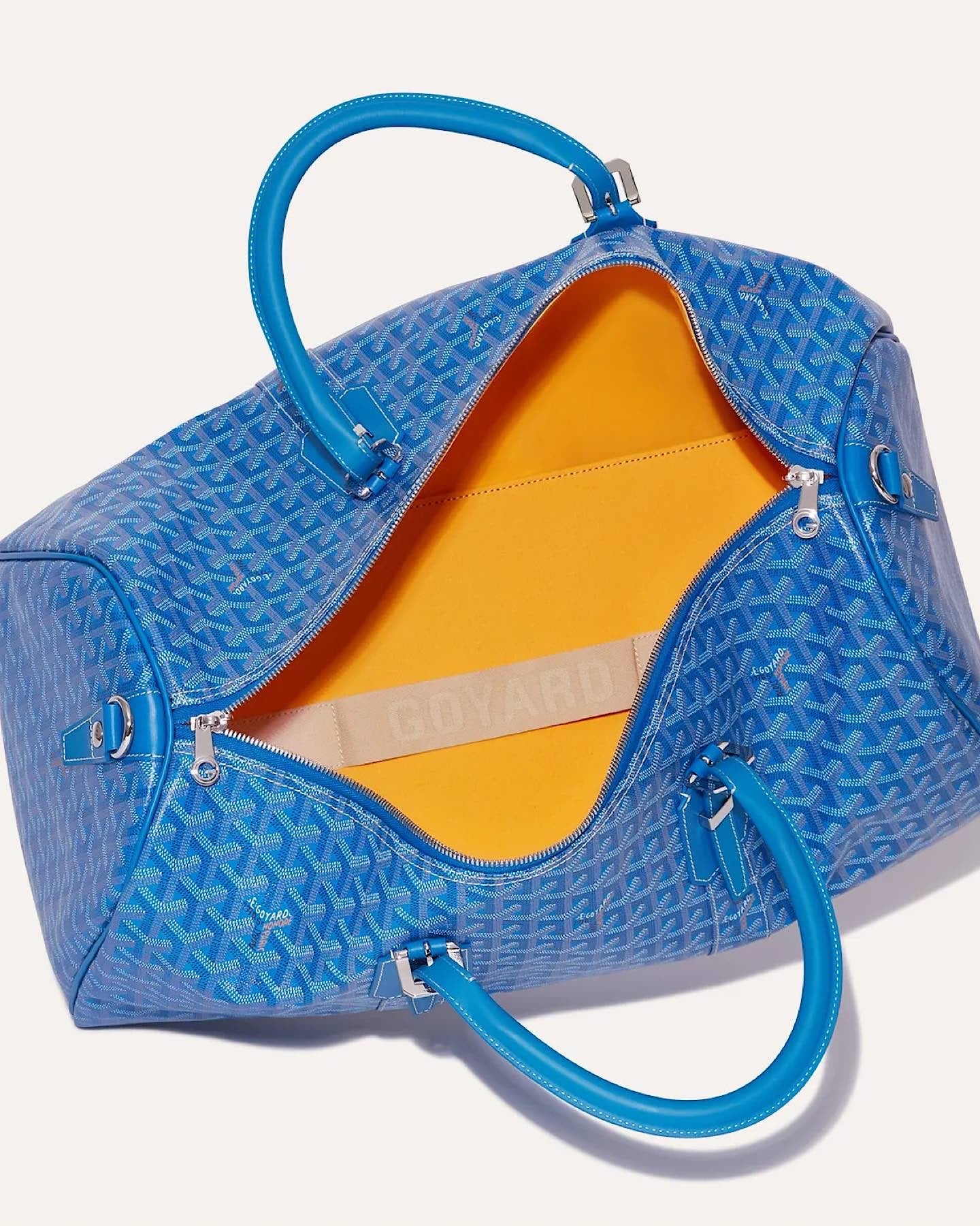 Luxury Goyard Boston 50 duffel bag in Sky Blue, spacious designer travel bag.