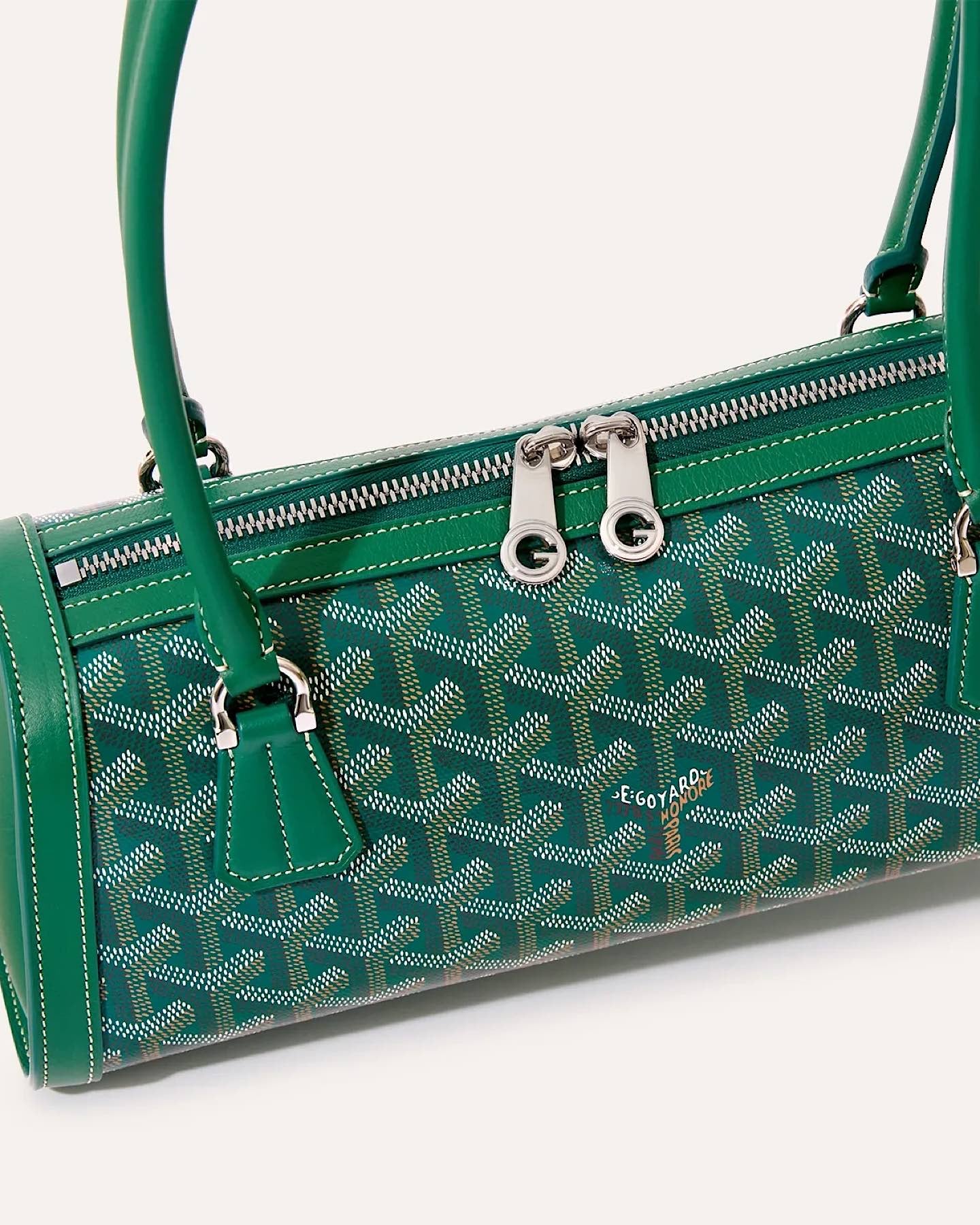 Side view of the Goyard Bonbonniere Bag Green highlighting the structured silhouette and premium leather details.