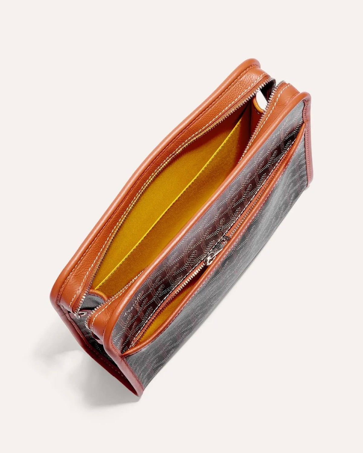 Brown Goyard Jouvence MM travel toiletry bag with zip closure and premium leather details